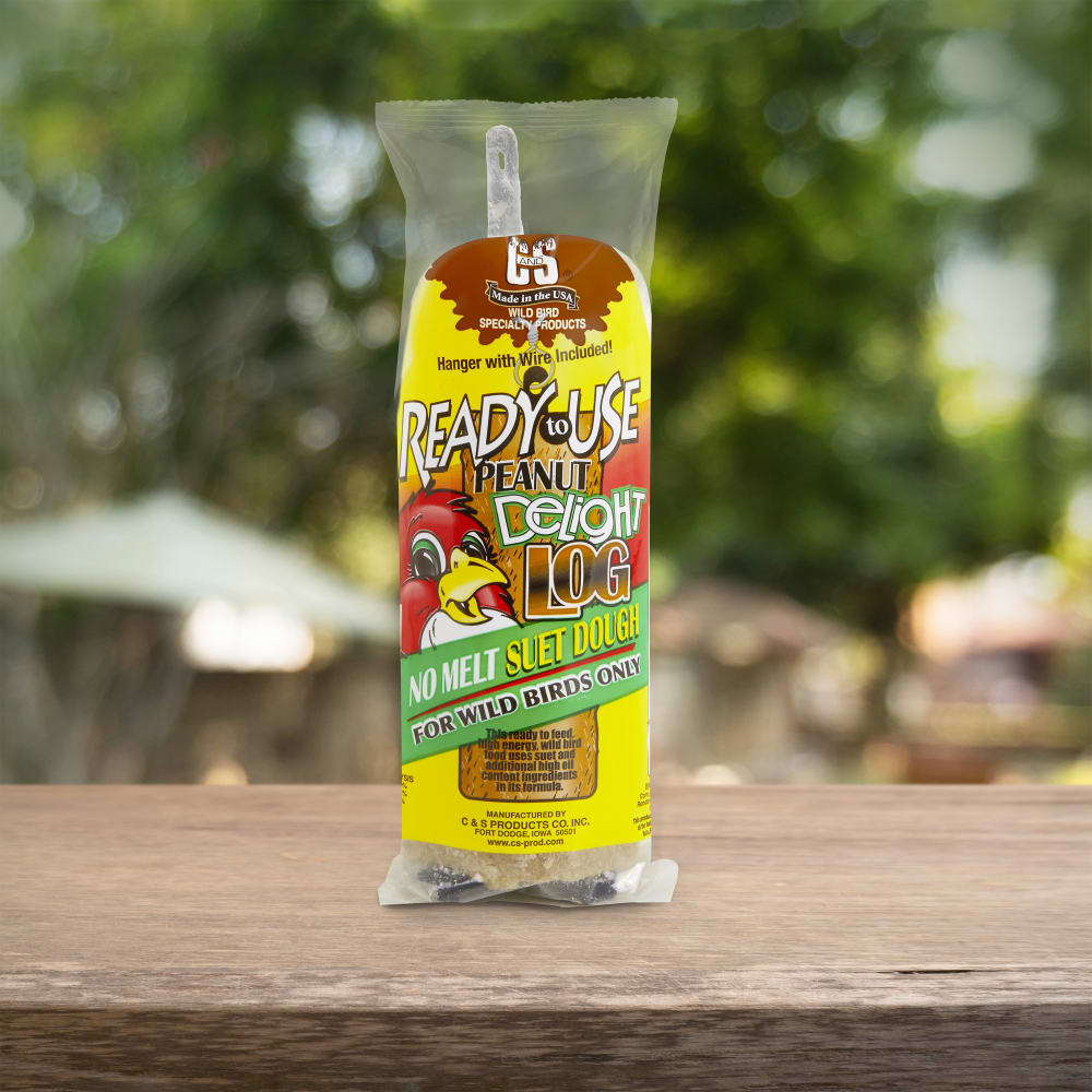 Up close shot of C&S  Peanut Delight No Melt Suet Dough Log on table