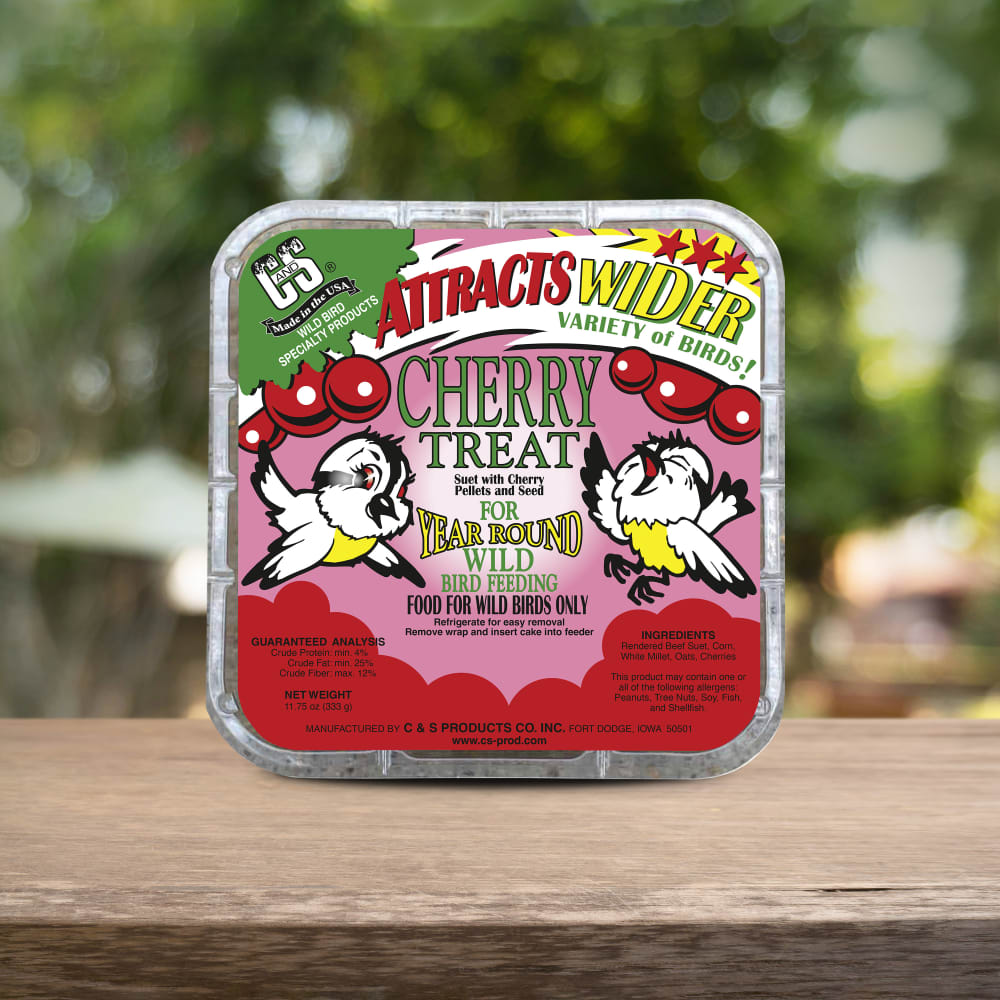 Up close shot of Cherry Suet Treat sitting on a wooden table